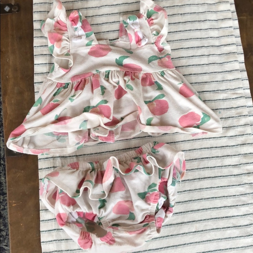 Peach two piece outfit.
